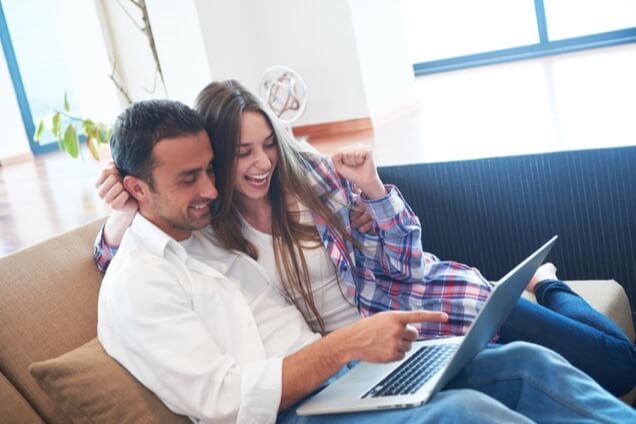 Lottoland winners celebrating A couple celebrates winning an online lottery bet with Lottoland