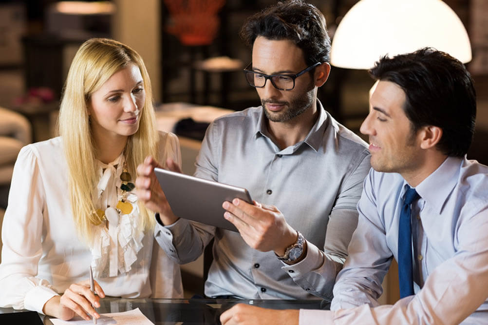 How Does Lottoland Work? Workers in Canada check out the Lottoland site on a tablet.