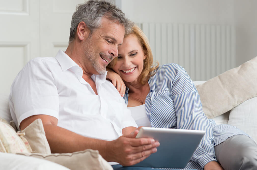 Why Lottoland Needs Your ID Older couple smiling after sending ID to Lottoland