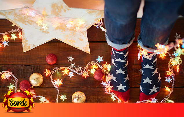 Woman wearing festive shoes and socks at Christmas