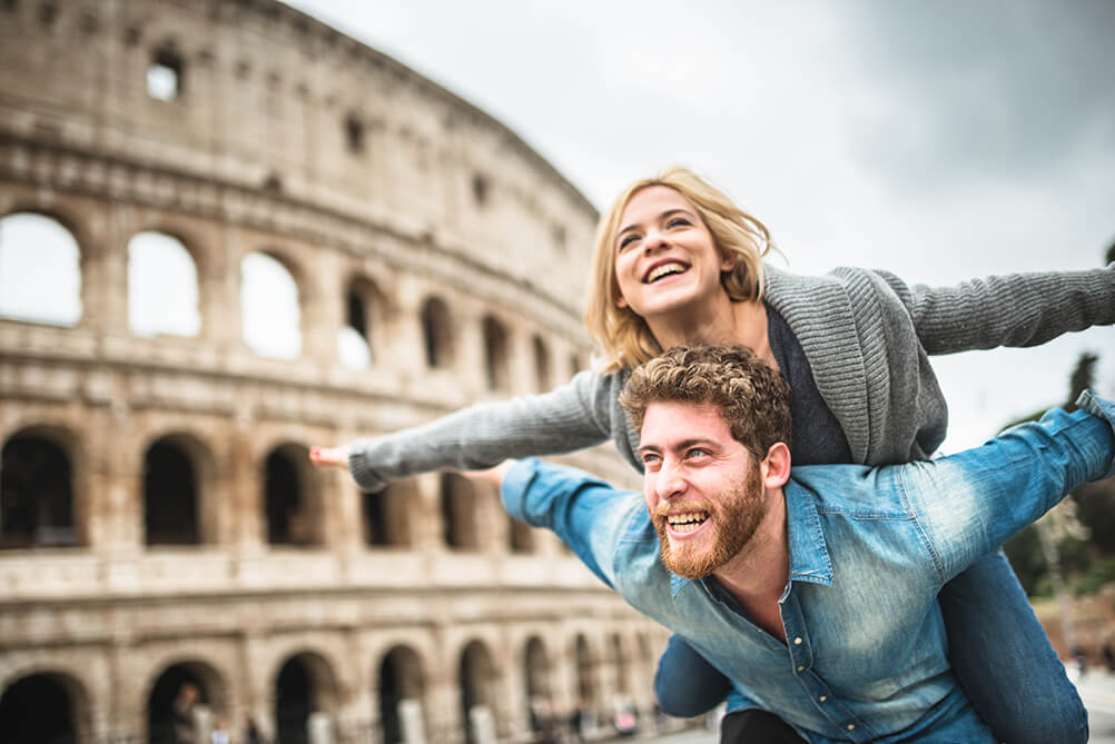 EuroMillions vs EuroJackpot Happy Couple in a European capital representing EuroMillions vs Eurojackpot