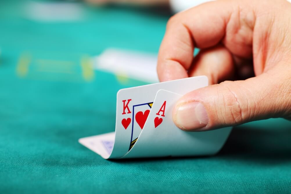 2 cards being shown on a casino table