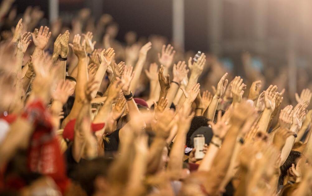 Correct Score Betting A crowd at a football match applauding a punter who knew what correct score betting is.