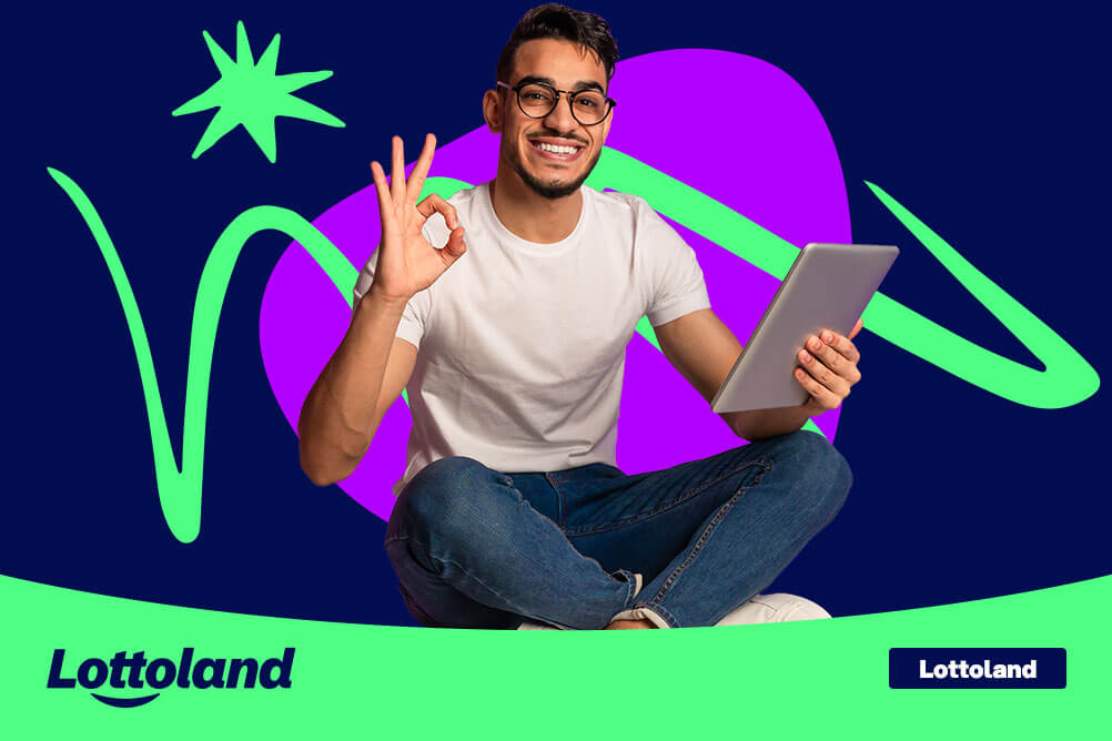 How Does Lottoland Work Smiling man holding a tablet and making an OK gesture, learning how Lottoland works.